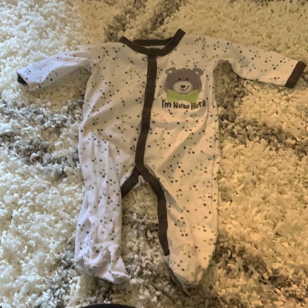 I’m new here onesie